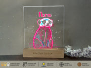 a neon light up picture of a koala