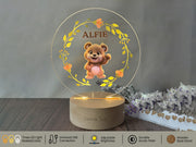 a clear acrylic with a picture of a teddy bear on it