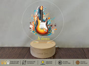 a guitar is on display on a wooden stand