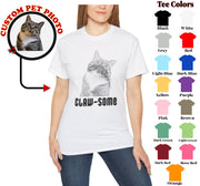 a woman wearing a white t - shirt with a picture of a cat on it