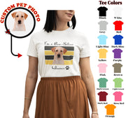 a woman wearing a t - shirt with a picture of a dog on it
