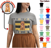 a woman wearing a t - shirt with a dog on it
