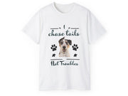 a white t - shirt with a dog's face and paw prints