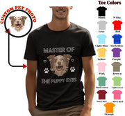 a man wearing a black t - shirt with a dog's face on it