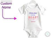 a baby bodysuit with a custom name on it
