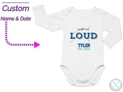 a baby bodysuit with the name and date printed on it