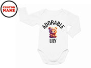 a baby bodysuit with a teddy bear on it