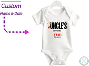 a baby bodysuit with the name and date on it