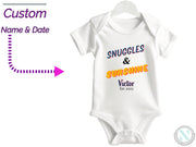 a white bodysuit with the words snuggles and sunshine on it