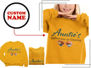 a woman wearing a yellow shirt with the name annie's fashion in training on