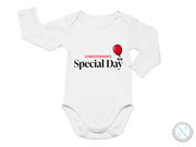 a white bodysuit with a red balloon on it