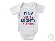 a white bodysuit that says tiny but mighty sophiia