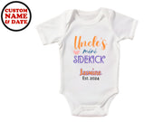 a white long sleeved bodysuit with the words uncle's mimi siderac