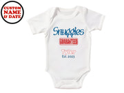 a white long sleeved bodysuit with the words smugies, quaranted