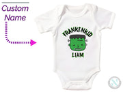 a white bodysuit with a green head and name on it