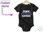 a baby bodysuit with the name tiny, terrible kayden on it