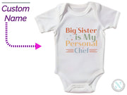 a baby bodysuit with the words, big sister is my personal chef