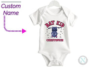 a baby bodysuit with the name pat kid on it