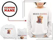 a white sweater with a picture of a bear on it