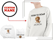 a white sweatshirt with a lion on the front and a custom name on the back