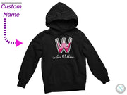a child's black hoodie with the letter w on it