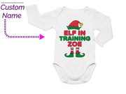 a baby bodysuit with the elf in training zone on it