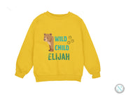 a yellow sweatshirt with a brown bear on it