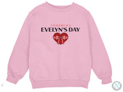 a pink sweatshirt with the words charming evelyn's day on it