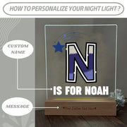 a glass block with a picture of a letter n on it