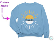 a light blue sweatshirt with the word camila printed on it