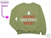 a green sweatshirt that says season's greetings violett