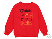 a red sweatshirt with the words birthday in girl charge stella on it
