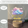 a personalized night light with a cloud and stars on it