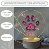 a personalized light with a dog's paw on it