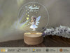 a personalized glass ornament with a fairy on it