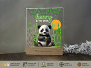a picture frame with a picture of a panda bear