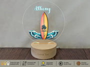 a surfboard with a palm tree on top of it