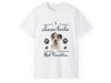 a white t - shirt with a dog&#39;s face and paw prints