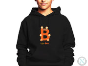 a young boy wearing a black hoodie with the letter b on it
