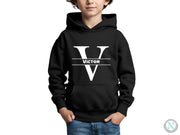 a young boy wearing a black hoodie with a v on it