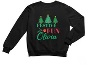 a young girl wearing a black sweatshirt with festive fun written on it