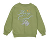 a green sweatshirt with a stary eyed lily on it